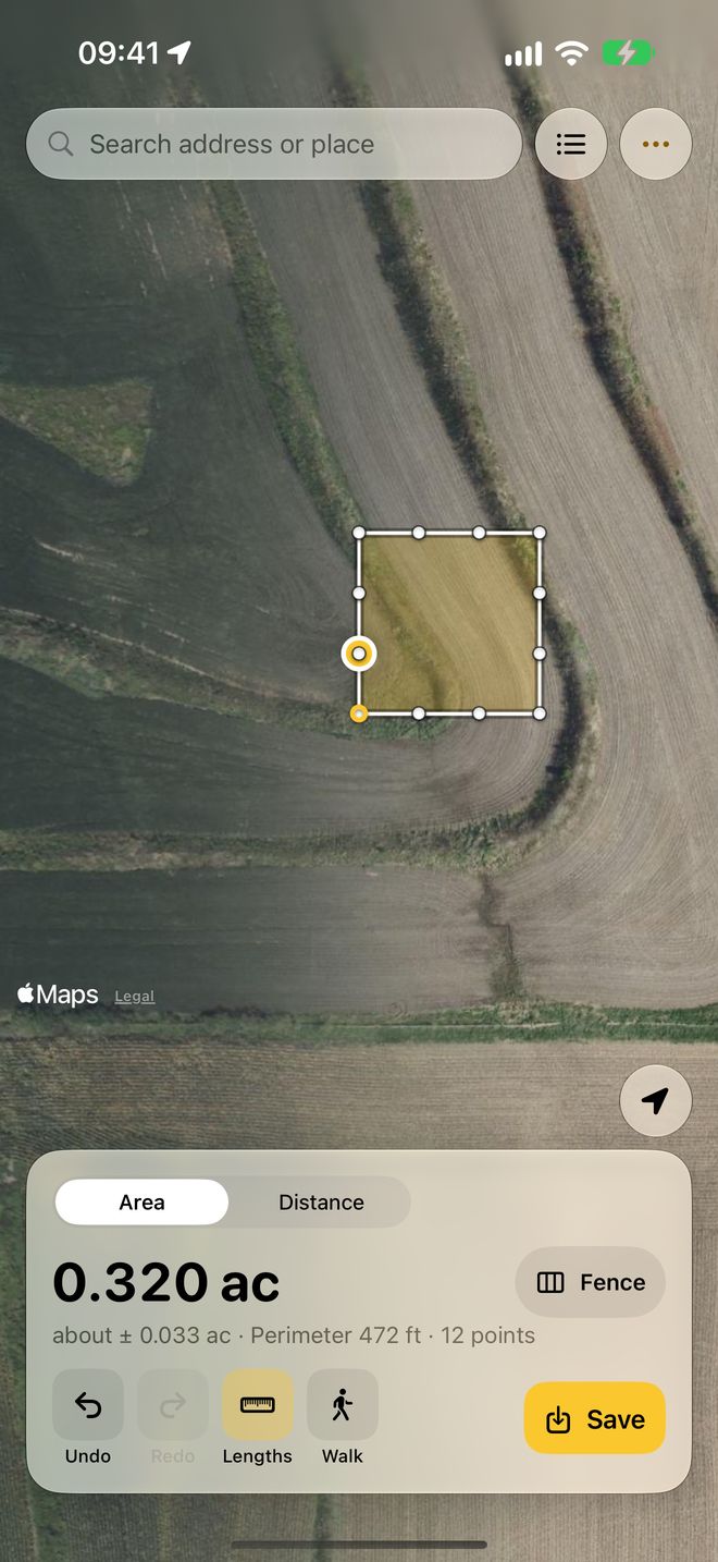 A boundary recorded by walking, with the area and an 'about plus or minus' accuracy line.